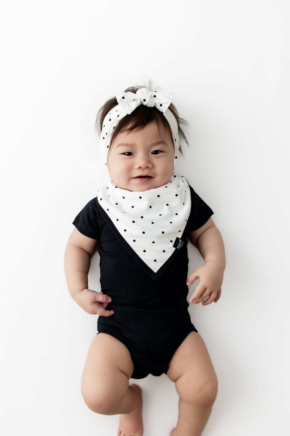 Bib in Midnight Polka Dot